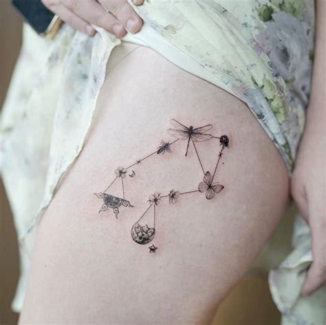 Libra Constellation Tattoo Located On The Thigh