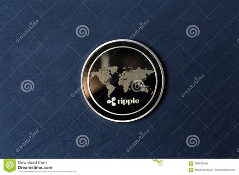 Moneda De La Ondulación En Un Fondo De La Placa De La Pizarra Imagen