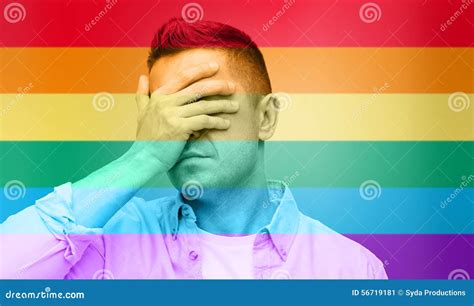 Gay Covering His Face By Hand Over Rainbow Flag Stock Image Image Of Liberty Covering 56719181
