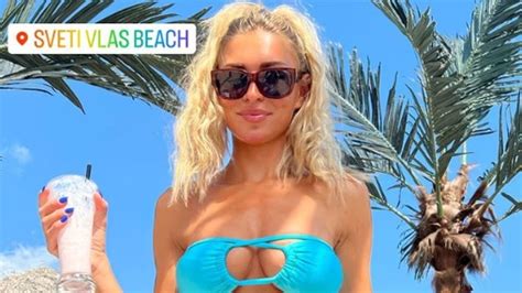 Zara McDermott Shows Off Her Incredible Figure In A Blue Bikini In Sizzling Throwback Snap