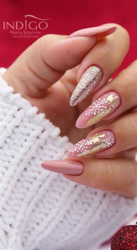 30 Christmas Nail Designs For 2021 Snowflake Pink And Shimmery Gold Nails