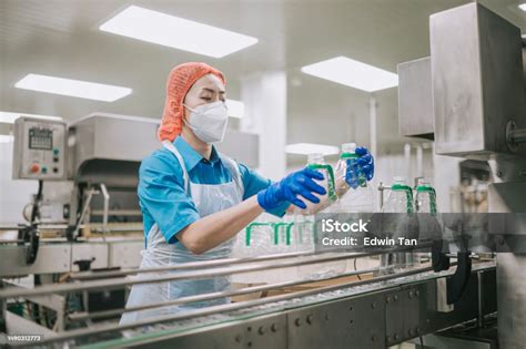 asian chinese fruit juice factory production  workers  ppe