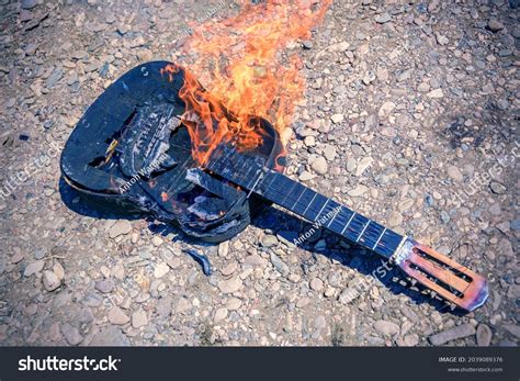 Black Acoustic Guitar On Fire Burning Stock Photo (Edit Now) 2039089376