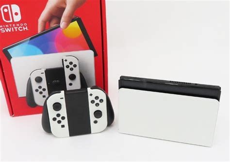 【やや傷や汚れあり】 【任天堂】nintendoswitchニンテンドースイッチ本体 （有機el） Heg S Kaaaa ホワイトの落札