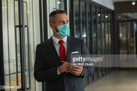 Business Man Mask Office High-Res Stock Photo - Getty Images