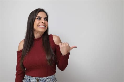 Premium Photo Beautiful Brunette Woman In A Red Blouse