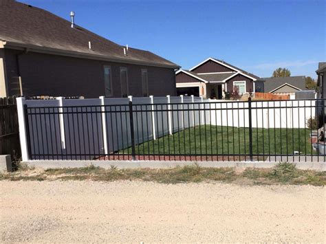 Deciding Between A Vinyl Or Aluminum Fence Our Wyoming Fence Company Can Help Blog Swi Fence