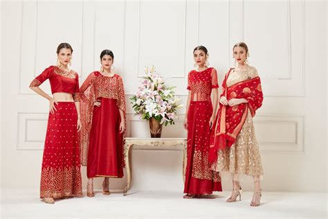 Group of Women Posing in Elegant, Red Dresses · Free Stock Photo