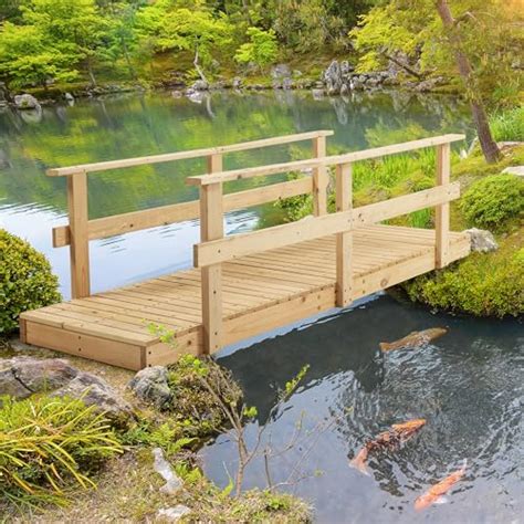wooden garden bridge  safety rails rustic footbridge  ponds