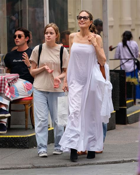 Angelina Jolie Stuns In A White Dress While Shopping For Books With