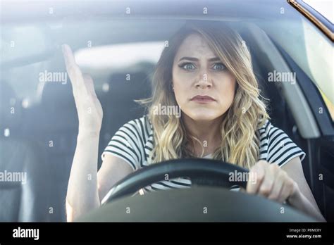 Angry Woman Driving A Car Stock Photo Alamy