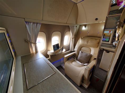 Review: Emirates 777-300ER NEW First Class Dubai To Brussels - Live and ...