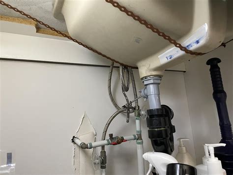 Moisture causing Rust under Bathroom Sink : r/Plumbing