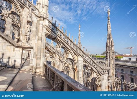 View Of Gothic Architecture And Art On The Roof Of Milan Cathedral