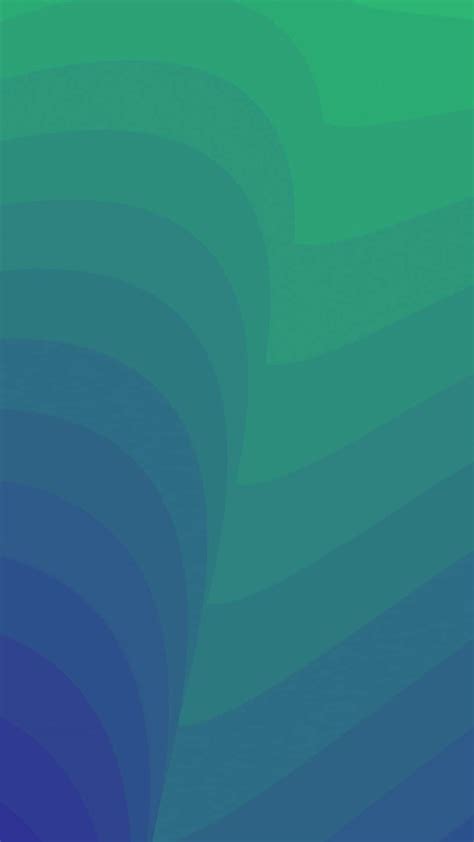 Download A Blue And Green Wave With Waves | Wallpapers.com