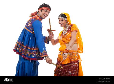 Performing dandiya raas hi-res stock photography and images - Alamy