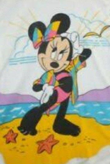 Mickey And Minnie Mouse On The Beach