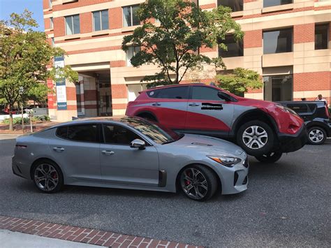 This Sad Kia Stinger Was Squished By A Toyota Rav4 Carscoops