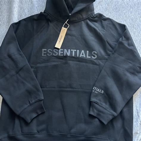 essentials hoodie large depop