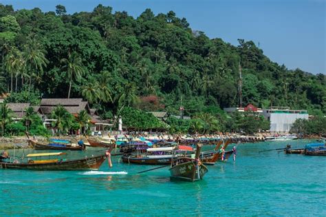 Premium Photo Traditional Thai Fishing Boats Wrapped With Colored