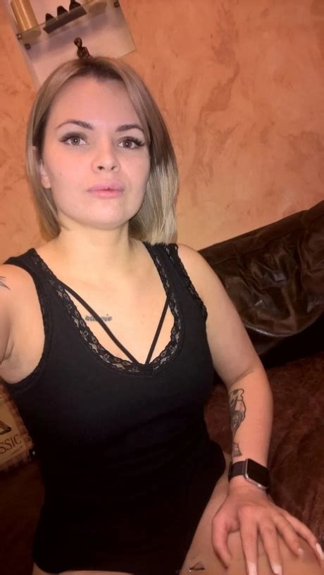 Blonde Babe Shows Her Small Tits Her Shaved Pussy In Black Lingerie