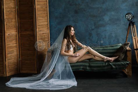 Beautiful Woman In Lingerie Showing Long Legs Sexy Pose Standing Stock Photo Crushpixel