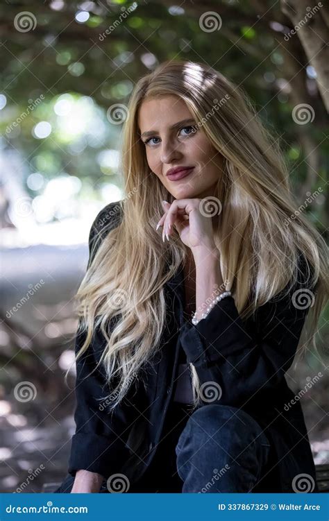 Blonde Beauty Glows In Autumn Sunlight Capturing A Perfect Moment Of Serenity And Radiance