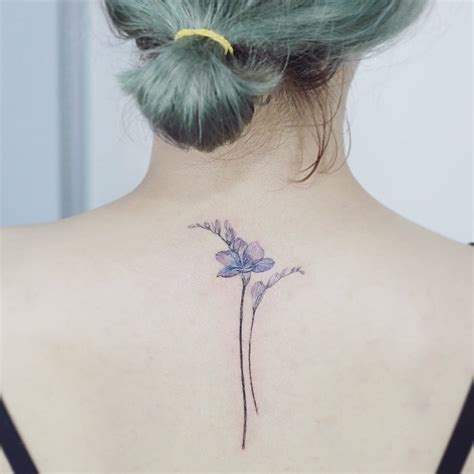 Freesia flowers by @tattooist_flower - Tattoogrid.net