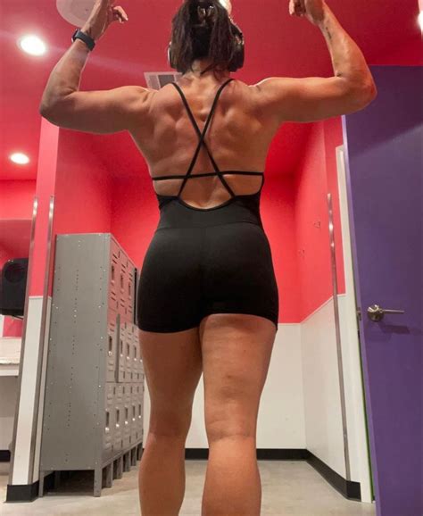 the back of a woman's body showing her muscles