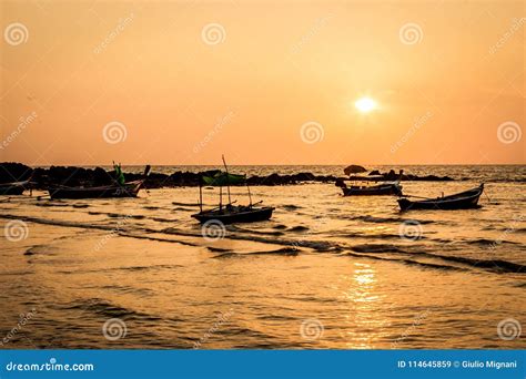 Traditional Thai Long Tail Boats At Sunset Long Beach Ko Lanta