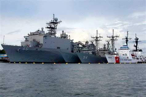 U.S. Navy and Coast Guard ships, from left, the amphibious dock landing ...