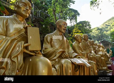 Closeup Of Golden Buddha Statues Along The Path To Ten Thousand Buddhas