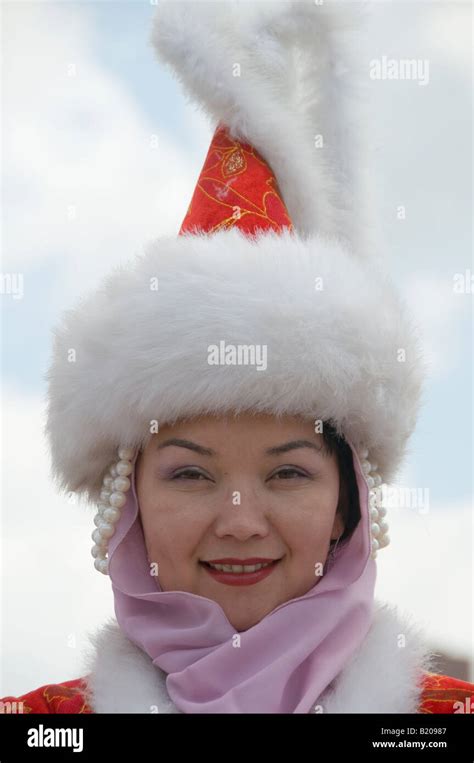 Kazakh Woman Wearing Traditional High Headdress Called Saukele For