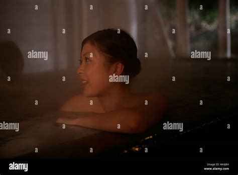Woman Relaxing In Hot Tub Stock Photo Alamy
