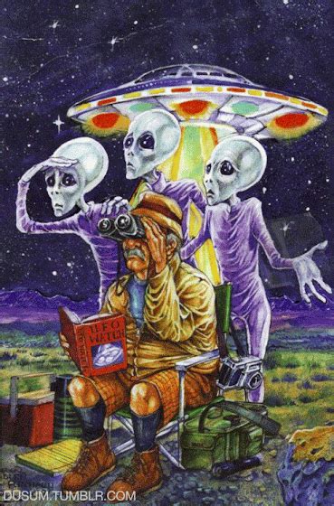 Two Aliens Are Sitting In Front Of A Man With A Camera And Another