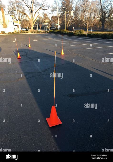 Temporary cones for driving test in a parking lot Stock Photo - Alamy