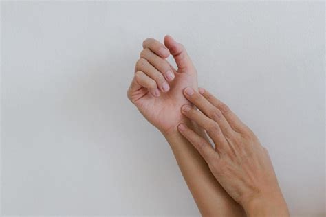 Closeup of hand with hand pain in palm isolated on gray wall background. 15175990 Stock Photo at ...