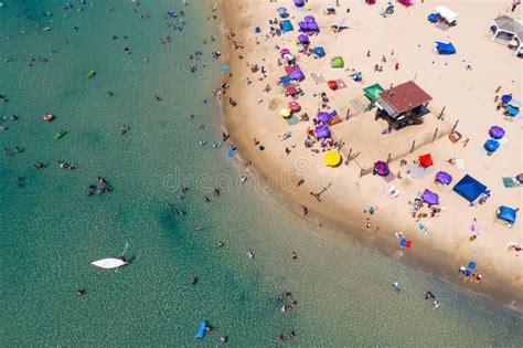 Crowded Public Beach With Colourful Umbrellas Aerial View Stock Image