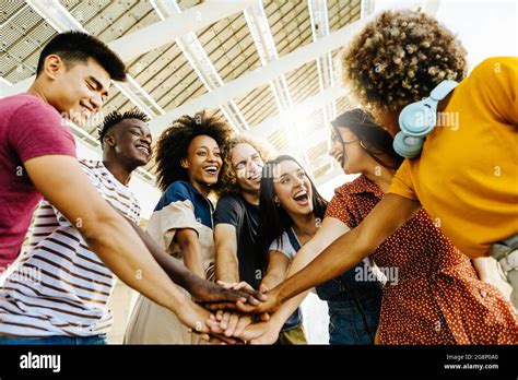 Multiracial Happy Friends With Hands In Stack Multi Ethnic Diverse