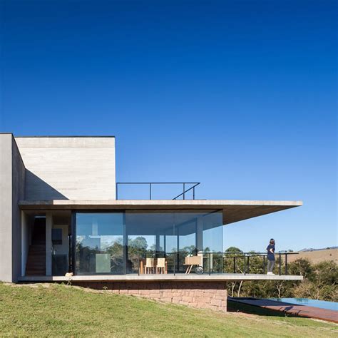 Concrete Balcony Extends From Brazilian House By Felipe Rodrigues