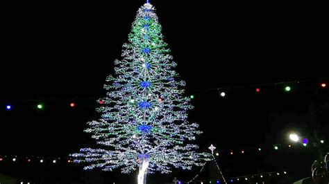 a large christmas tree with lights on it 35056876 Stock Video at Vecteezy