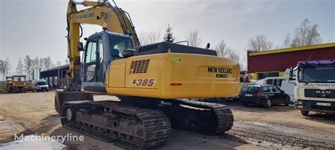 New Holland E385 tracked excavator for sale Lithuania Kužiai XV39609