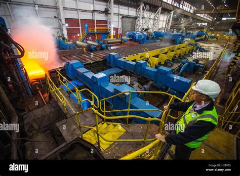 Red Hot Steel Being Pressed In Steel Works Stock Photo Alamy