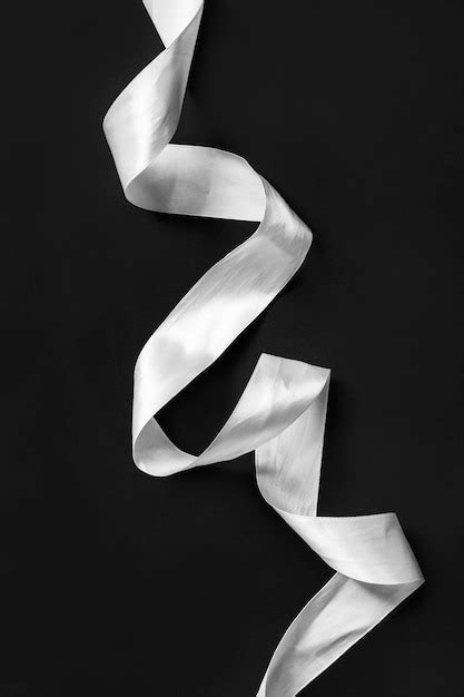 Premium Photo White Ribbon On Black