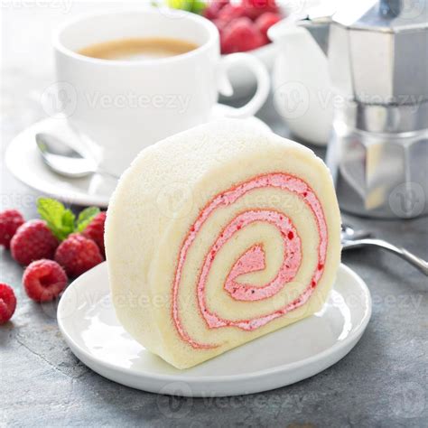 Vanilla roll cake with berry filling 15757019 Stock Photo at Vecteezy