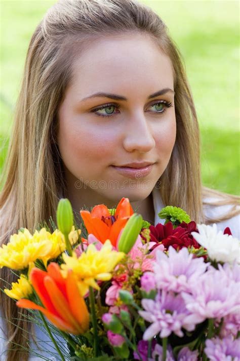 Relaxed Blonde Girl Holding A Bunch Of Flowers Stock Image Image Of Elegant Countryside