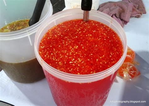 Tofu Photography A Bucket Of Chilli Sauce Seen At The Evening Food Market In Trang Thailand