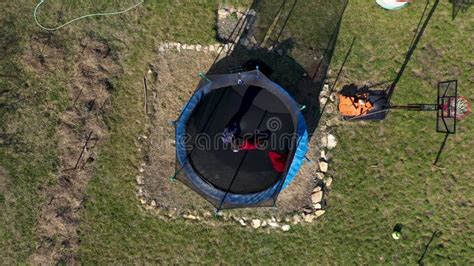 Aerial Slow Motion View Of Mother With Her Daughter Having Fun And