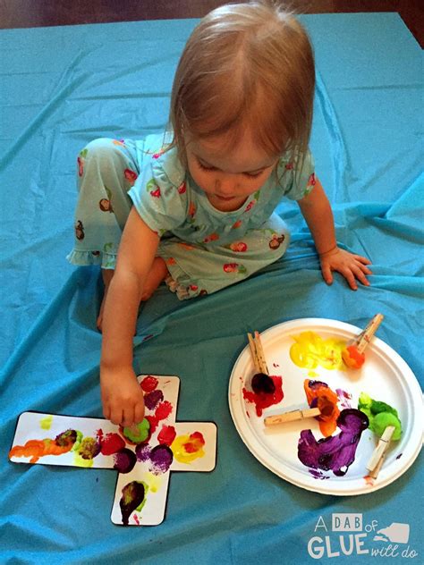 A Dab of Glue Will Do: Pom Pom Cross Activity