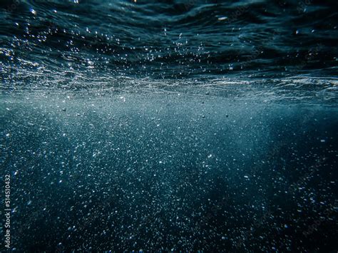 Tropical blue ocean with white bubbles underwater in Mediterranean Sea ...